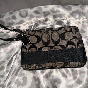 Coach gray and black monogrammed wristlet removable strap inside is clean cute